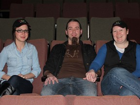 Hoagies, Movies and Games employees, from left, Samantha Roughley, owner Jamie Peterson and Kate Davis, try out the seats in the new Silver Screen theatre, which opened March 11.
Emma Taylor for The Gananoque Reporter