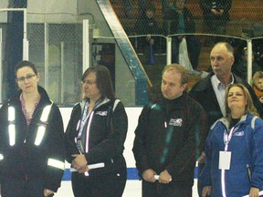 Fairview RCMP Constables Melissa Kelsey (far left) and Derek Howes (far right) bookend the VIPS at the Atom B Provincials Opening Ceremonies. From left: Lloyd Campbell, vice president of Fairview Minor Hockey, Jillian Ferrari, former member of the gold-medal winning women’s Olympic Hockey team, Janet Fairless of Hockey Alberta, Ken Woronuk president of Fairview Minor Hockey, Ernie Newman, Reeve of the M.D. of Fairview, Cheryl Lyman of Investors Group and Town of Fairview mayor Gord Macleod