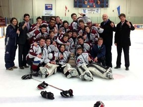 The AC Avalanche celebrate winning the Sutter Cup South Alberta championship in Lethbridge on Sunday, March 10. The team now competes for the minor midget AAA provincial title in Edmonton beginning Wednesday, March 20. Submitted photo