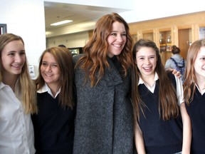 Canadian summer and winter Olympian Clara Hughes speaks to some Regiopolis-Notre Dame Catholic High School students prior  to speaking at the school to Kingston area students on Wednesday as part of a Boys and Girls Club of Kingston event.
Ian MacAlpine The Whig-Standard