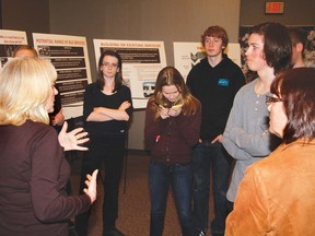 Kathy Dietrich, Cochrane senior manager of planning and engineering services, explains the pros and cons of three first step options for transit in Cochrane during the Mayor’s Youth Council’s meeting on Mar. 13.