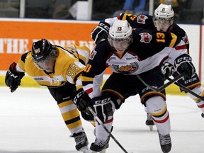 Kingston Frontenacs’ Spencer Watson chases Barrie Colts’ Tyson Fawcett during Ontario Hockey League action at the K-Rock Centre on Feb. 1. The Frontenacs and Colts open a best-of-seven Eastern Conference quarter-final playoff series Thursday night in Barrie. (Whig-Standard file photo)