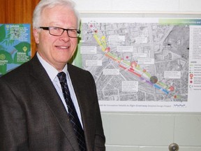 Bruce Cudmore, one of the principals with EDA Collaborative, stands next to a rough representation of the Elgin Greenway's route. Jonathan Migneault The Sudbury Star