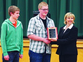 Fort High student Alan Wooden is honoured by Mayor Gale Katchur for having saved classmate Jayson Williams.

Photo by Aaron Taylor/Fort Saskatchewan Record/QMI Agency