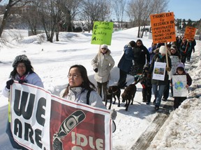 Kenora Idle No More organizers Marlene Elder and Tania Cameron lead supporters on a march from McLeod Park to the Harbourfront in support of United Nations World Water Day, Thursday, March 21.