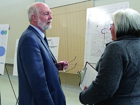 Edmonton resident Chris Batty chats with Strathcona County’s Brenda Thomlison about potential new transit routes for the community. The county plans on initiating new routes following the opening of the Bethel Transit Terminal, which is currently scheduled for December. The new routes will most likely be added in the New Year. Leah Germain/Sherwood Park News/ QMI Agency