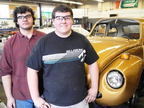 SARAH DOKTOR Simcoe Reformer
T.J. Wilson and Jordan Salmon-Bosque are among the students at Simcoe Composite School working on restoring a 1974 Volkswagen Super Beetle. The project started at Delhi District Secondary School and also included work from Valley Heights Secondary School students.