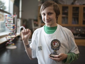 Grade 8 Banff Community High School student Aaron Howe shows off the QR code technology that helped win him first prize at this year's Canadian Rockies Regional Science Fair. Glenn Kelly/ Banff Crag & Canyon.