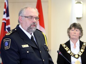 Frontenac County chief of paramedic services Paul Charbonneau, accompanied by Warden Janet Gutowski.  
Elliot Ferguson The Whig-Standard