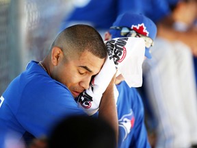 Blue Jays lefty Ricky Romero towels off after another rough outing versus Tampa Bay on Thursday. (Craig Robertson/Toronto Sun)