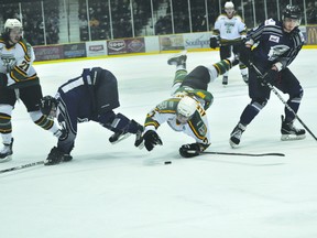 Terriers defenceman Matt Alexander is upended during a game earlier in the series against Steinbach. (Kevin Hirschfield/PORTAGE DAILY GRAPHIC/QMI AGENCY)