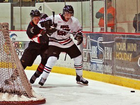 DARRYL G.SMART, The Expositor

Blast forward Brad Jones tries to get by a Real McCoys defender in Game 5 at civic centre of their best-of-seven Allan Cup Hockey championship series. The Blast won 4-1, to lead the series 3-2. Game 6 is Thursday night at J.L. Grightmire Arena in Dundas at 7:30 p.m.