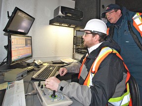 BRIAN THOMPSON, The Expositor

Brantford Mayor Chris Friel operates a robotic sewer camera under the supervision of Bob Farrell, a camera operator with the city's wastewater division, as they inspect underground pipes on Chatham Street on Thursday.  A number of city councillors rode along with municipal workers to get a better understanding of their responsibilities.