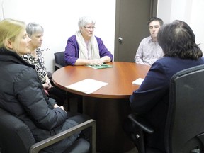 Elaine MacDonald (centre), president of the Cornwall Labour Council, visited MPP Jim McDonell’s office on Thursday, along with other poverty activists to lobby for a higher minimum wage.
Staff photo/CHERYL BRINK