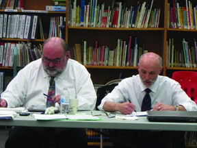 Superintendent Hazen Barrett, and assistant superintendent Mike Mauws pictured during Thursday's school board meeting where it was announced the division would be receiving grants from the Basic French Revitalization Program as well as from the Portage Community Revitalization Corporation (PCRC). (ROBIN DUDGEON/PORTAGE DAILY GRAPHIC/QMI AGENCY)