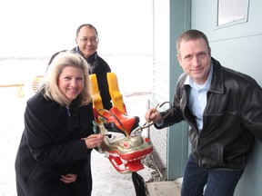 Greater Sudbury Mayor Marianne Matichuk, Steve Lee, middle, co-chair of the Sudbury Dragon Boat Festival, and Thomas Merritt, board chair of the Northern Water Sports Centre, participate in the Awakening of the Dragon ceremony at the Sudbury Canoe Club on Thursday, March 21, 2013. See video at www.thesudburystaer.com JOHN LAPPA/THE SUDBURY STAR/ QMI AGENCY