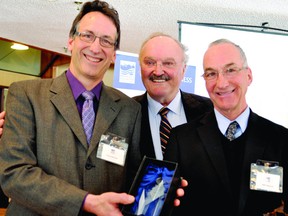 Stephen Mazurek, left, and his brother John, right, pose with Brockville lawyer Mike O'Shaughnessy after receiving a Lifetime Business Achievement Award from the Brockville and District Chamber of Commerce at the Brockville Country Club Thursday morning.RONALD ZAJAC The Recorder and Times