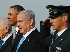 U.S. President Barack Obama (2nd L) participates in a farewell ceremony with Israeli Prime Minister Benjamin Netanyahu (2nd R) and President Shimon Peres (L) at Tel Aviv International Airport, March 22, 2013.  REUTERS/Jason Reed