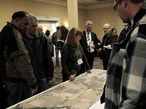 Maps and graphs laying out a potential route for a twinned Highway 19 were viewed by hundreds of residents at the Tuesday, Mar. 19 open house.