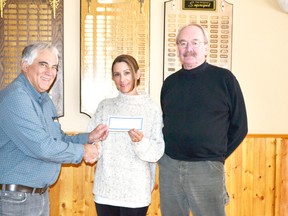 Pictured handing over the $4,000 travel voucher to the lucky winner is Port Elgin Curling Club member Chris Rocheleau, winner Virginia Carson and Ron Harper of Hampton Travel.