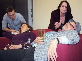 Members of the Take Two Theatre troupe have been rehearsing three or for times a week for their upcoming comedic play Sex, Lies and the IRS. The play will run April 11-13 at The Porcupine Dante Club. The actors plying their craft include, from left, Jim Taylor, Linley Morrison, Jeanette McCreight, and Gordon King, whose character might have had one drink too many.