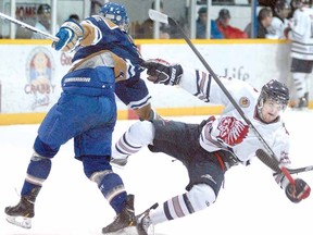SCOTT WISHART The Beacon Herald
Mitch Vandergunst of the Stratford Cullitons is sent to the ice in a collision with a Caledonia Corvairs player in the first period of Friday night's GOJHL Midwestern Conference game at the Allman Arena.