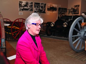 Sitting in a great hall surrounded by local treasures, Bonnie Burke looks back on a carreer that came close to three decades at the Brockville Museum (DARCY CHEEK/The Recorder and Times).