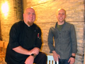 Jake Schieman, right, is opening The Front Door, a new restaurant featuring locally-sourced foods and craft beers on Front Street. Chef Dave McMurray, left, is developing a menu with "a new spin on old classics." Extensive renovations have stripped the walls back to the original brick. CATHY DOBSON/THE OBSERVER/QMI AGENCY