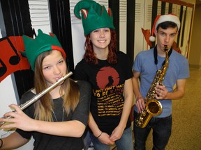 Students in the Waterford District High School's band and choir will perform a Christmas in March concert on Tuesday. Showing off their holiday spirit are Grade 10 student Kayleigh McKay, Grade 10 student Jessica Rayner and Grade 11 student Adam Nigh. (SARAH DOKTOR Simcoe Reformer)