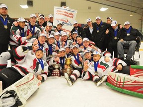 The Southside Athletic Club (SSAC) Southgate Lions celebrate winning the team's third straight Alberta Major Bantam Hockey League (AMBHL) provincial championship after their 6-2 victory over the Calgary Northstar Sabres at Bill Hunter Arena on Saturday, March 23, 2013. The Lions swept the best-of-five series 3-0. TREVOR ROBB/ EDMONTON EXAMINER