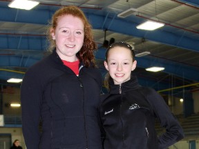 Paige Newman, left, and Hannah Ross of the Chatham Skating Club. (TREVOR TERFLOTH/The Daily News)