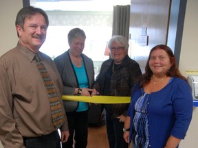 Past-President of the Maple Leaf Chapter of the IODE Nancy Hughes and Regent Joan Winter, cut the ribbon on the second palliative care unit at the Alexandra Marine and General Hospital March 21, along with Deputy-Mayor John Grace and campaign co-chair Judy Marshall.