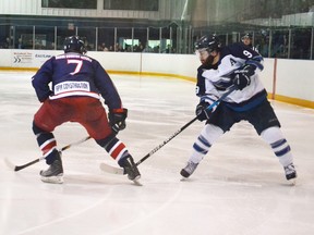 The Saugeen Shores Winterhawks tied up the North series 2-2 after a 6-4 win at home on Saturday. The previous night in Elora, the ‘Hawks lost 3-2 in overtime. Pictured is ‘Hawks player Bryan Kazarian shooting the puck hard at the net past Elora’s defenceman Pat Shantz, during the third period of Saturday night’s home game at The Plex in Port Elgin.