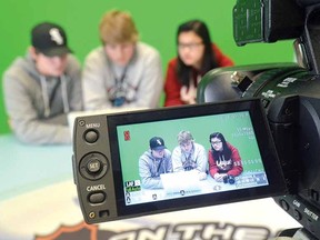 Stratford St. Michael students Dan Bader, 17, Adam Thomas, 18, and Elisha Bauer-Maison, 16, have all created social documentaries with the skills they've honed at school. (SCOTT WISHART The Beacon Herald)