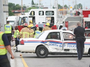 A Hyundai Santa Fe crashed into this North Bay Police Service cruiser at the intersection where Algonquin Avenue and Highway 11 meet McKeown Avenue and Airport Road on June 21, 2011. (NUGGET FILE PHOTO)