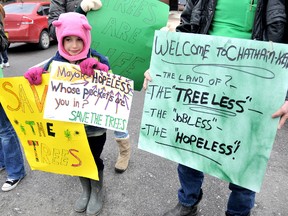 Phaedra Williams, 7, of Ridgetown, was one of several children at the demonstration in favour of the tree bylaw. Williams has seen a number of woodlots near her family's homestead be demolished in the last few weeks. PHOTO TAKEN: Chatham, On., Monday March 25 2013. DIANA MARTIN/ THE CHATHAM DAILY NEWS/ QMI AGENCY