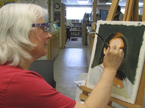 Janice Pettifer of Mayerthorpe works on a portrait during the second day of a two-day workshop taught by Deanne Jackson, a Rochfort Bridge artist who also teaches in Edmonton. Pettifer said this workshop held at the Mayerthorpe Public Library on Monday, March 18, is her first time in an art class and the portrait she is working on is an image provided by Jackson. Jackson said the focus of the workshop is a breakdown of values and understanding skin colour.
