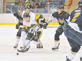 EDDIE CHAU Simcoe Reformer
Simcoe Storm forward Clayton Chalmers rushes with the puck as member of the Dunnville Mudcats trail during a Jan. 27 game. Despite his investment in a new Junior B team in Brantford, Simcoe Storm owner and head coach Darren DeDobbelaer said he's continuing his duties with the Junior C organization.