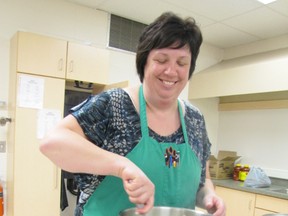 Shelley Knott stirs pasta for the fundraising Jolene Coté Memorial Spaghetti Supper and Basketball Game Friday, March 22. The foods teacher said she started working at Mayerthorpe Junior Senior High School the same year as Coté and they were friends.