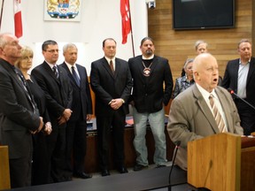 Minister of Northern Development and MInes Michael Gravelle speaks to the media as members of the advisory committee on Ontario Northland Transportation Commission divestment gather at North Bay City Hall in this file photo. A Northern leadership forum will be held in Timmins Dec. 6 for northern leaders to discuss concerns they have with the Northern Ontario Growth Plan.