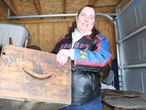 Mary Swanhaus, co-executive producer for Canadian Pickers, looks over some items in North Bay.