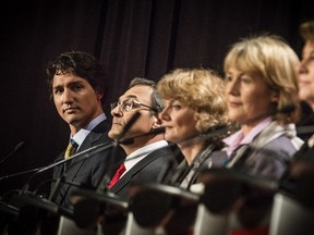Candidate (left) Justin Trudeau takes part in the Federal Liberal Party Candidate Leadership Debate in Vancouver, British Columbia, Sunday January 20, 2013, Nine leadership candidates share their views on pipeline and oil sands development, the challenged facing aboriginals, electoral cooperation, foreign ownership and Pacific Rim trade in the first 2013 LPC Leadership Debate in Vancouver. (CARMINE MARINELLI/QMI AGENCY)