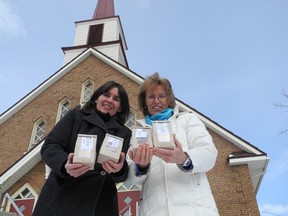 Staff photo/ERIKA GLASBERG
Sylvie Thibert and Mary Brink, organizers of the Healthy Living Wellness Fair, with bags of products that will be found at the fair on April 6, from 1-4 p.m. About 30 area vendors will be setting up booths at the Harvest Christian Fellowship Church at 847 York St. to showcase gluten free and healthy alternatives. (For more, see Page 4.)