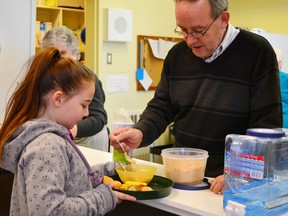 Pictured above right: Mayor Mike Smith sprinkling some brown sugar on top of Grade 2 student Olivia Hall’s cereal.