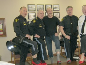 Pictured above from left to right:  Kevin Martin (Community Service Officer- South Bruce OPP), John LeBlanc (South Bruce OPP), Brian Kelly (representing the Municipality of Kincardine), Gary Yost (Domestic Violence Coordinator- South Bruce OPP) and Detachment Coordinator Inspector, Scott Smith of the South Bruce OPP.  Picture was taken at the Municipality of Kincardine Administration Centre and Mayor Larry Kraemer made a pledge to support Inspector Scott Smith and the team representing South Bruce OPP.