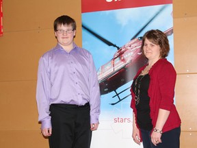 Austin (left) and mom Melissa Kreutzweiser at the STARS Gala held on March 23 in Melfort.