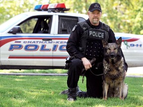 Const. Larry Johnson, and his five-year-old partner Bounty were recognized during Chatham-Kent Police Service's monthly police board meeting Tuesday. Bounty, who is responsible for the apprehension of 70 to 80 criminals over his career, is being retired due to arthritis. He will live out his life with Johnson's family. PHOTO TAKEN Chatham Ont, Friday May 19 2012. DIANA MARTIN/ THE CHATHAM DAILY NEWS/ QMI AGENCY