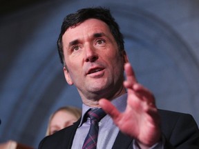 NDP Paul Dewar speaks to the media in Ottawa March 26, 2013.  Andre Forget/Postmedia Network