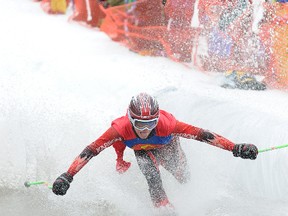 DHT file photo
Superman Ryan Danderfer flies across the water during the Nitehawk Recreation Area’s annual Slush Cup event Nitehawk’s ski hill south of Grande Prairie last year. This year’s Slush Cup runs Saturday afternoon