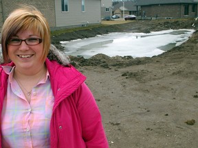 Diane Doucet has been named owner of the first Habitat for Humanity house to be built in St. Thomas and Elgin on the vacant north-side lot behind her. It will be home for Doucet and her four-year-old daughter. (Eric Bunnell, Times-Journal)